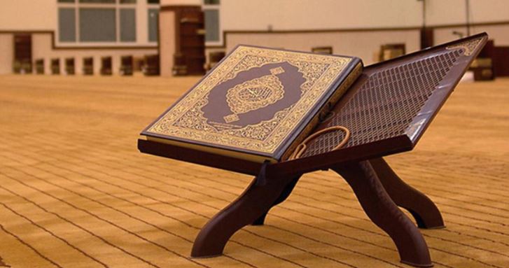 بالصور...الحاج يوسف عبابسة ...مسن فلسطيني يكتب القرآن بخطّ يده