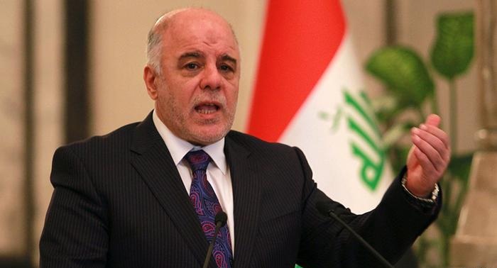 العبادي يأمر برفع العلم العراقي في المناطق المتنازع عليها 