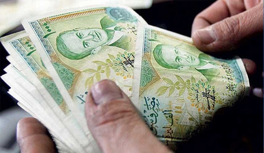 الليرة السورية تواصل تحسنها أمام الدولار