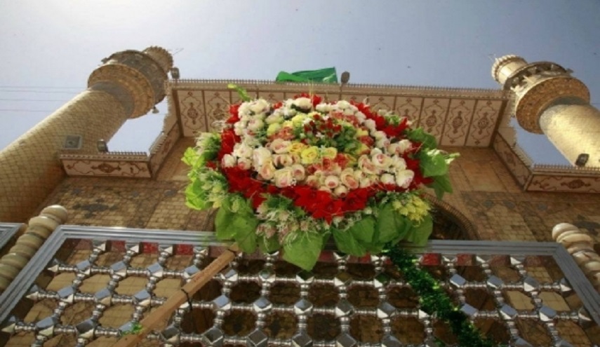  بالصور.. 14 ألف وردة إحتفالاً بولادة الامام علي (ع)
