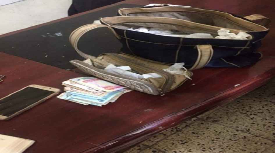شاهد بالصور....القبض على سراق الحقائب النسائية في بغداد 