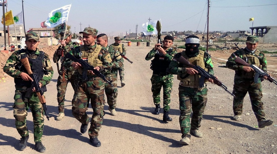  الحشد الشعبي يعلق على الإنسحاب الامريكي من سوريا