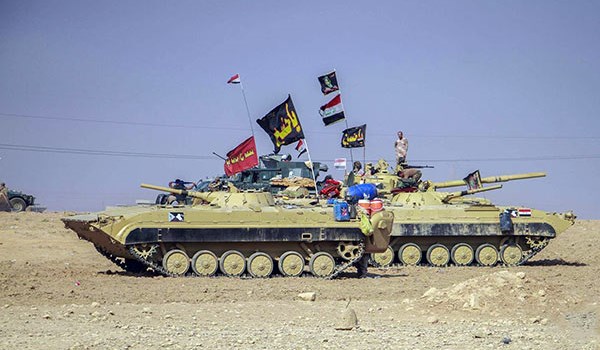 الحشد الشعبي يهدد بضرب المصالح والقواعد الأميركية في العراق