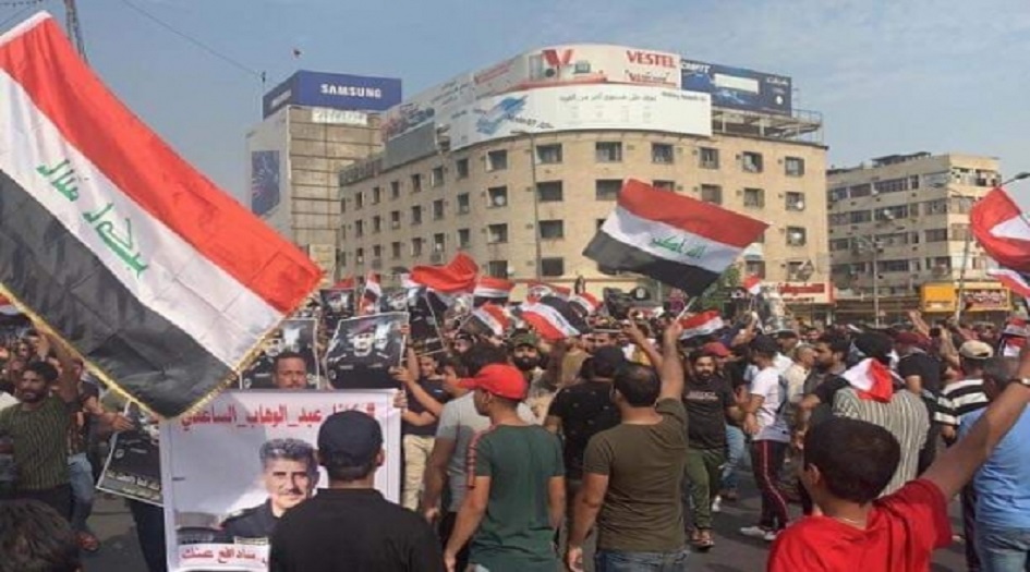 بالصور.. اصابات في صفوف الامن والمتظاهرين بساحة التحرير وسط بغداد