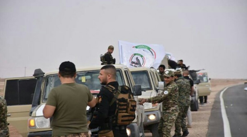 الحشد الشعبي يوزع 400 سلة غذائية بين الفقراء في محافظة البصرة
