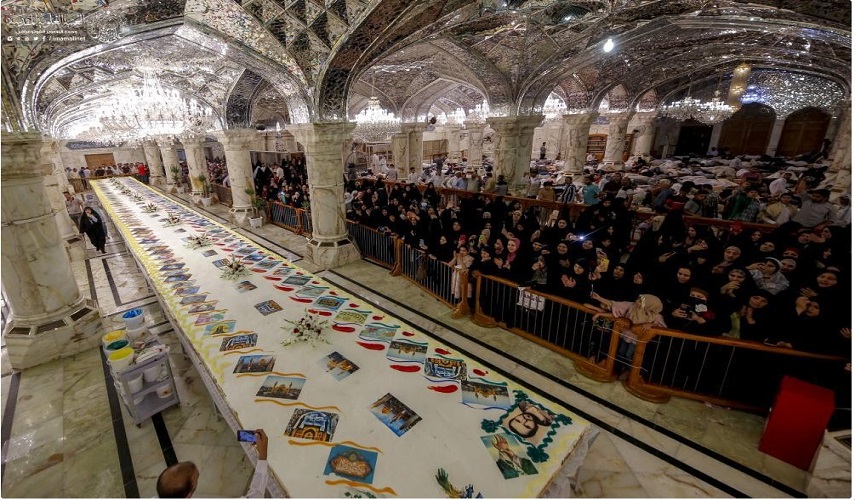 شاهد.. العتبة العلوية تقدّم كيكة بطول 1433 مترا للزائرين الكرام