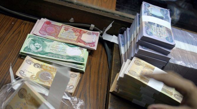 الكشف عن "أكبر عملية سرقة" اموال في تاريخ العراق !!
