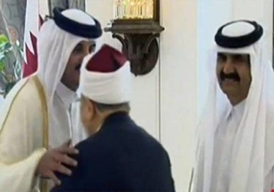 في تحدٍّ جديد.. أمير قطر يستقبل القرضاوي