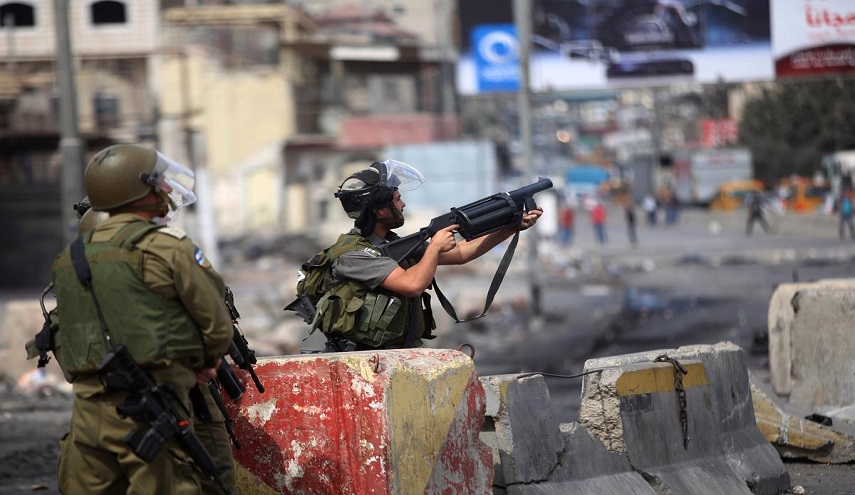 اصابتان بالرصاص واعتقال فلسطيني بمواجهات في الضفة الغربية