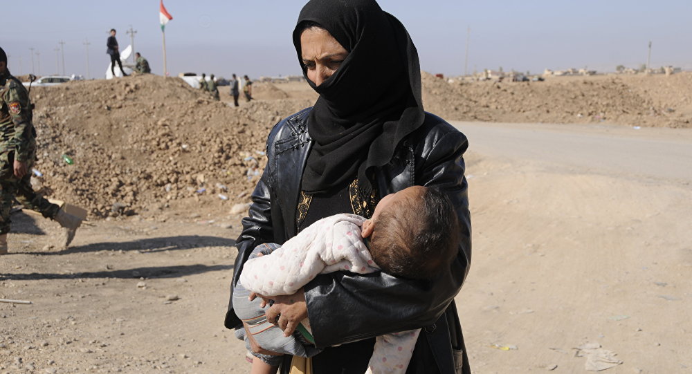 هروب مئات النساء من سيطرة "داعش" في غرب العراق