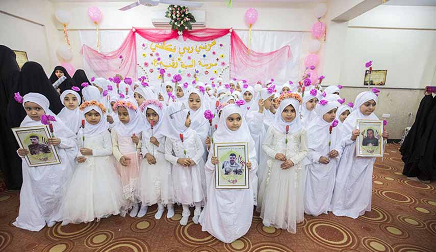 بالصور.. حفل تتويج الفتيات بالحجاب الشرعي في مدرسة تابعة للعتبة الحسينية