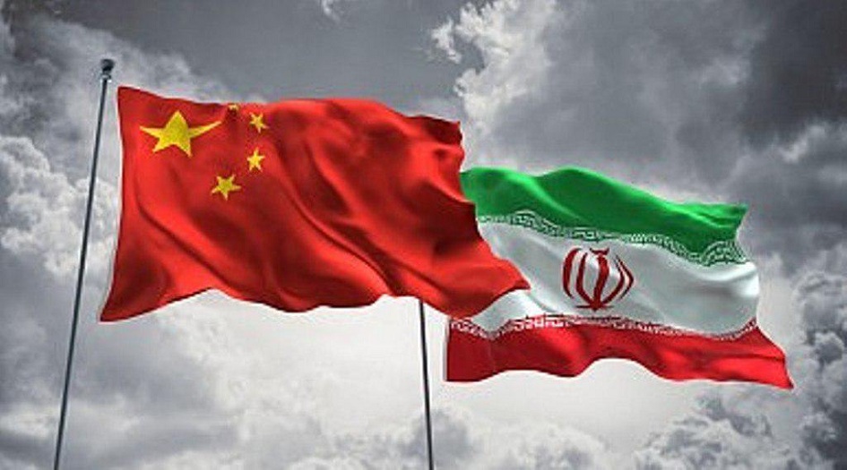 طهران وبكين تؤكدان على تطوير التعاون الثنائي على المستوى الدولي