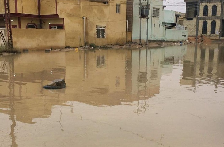 بالصور: غرق حي القادسية في كربلاء