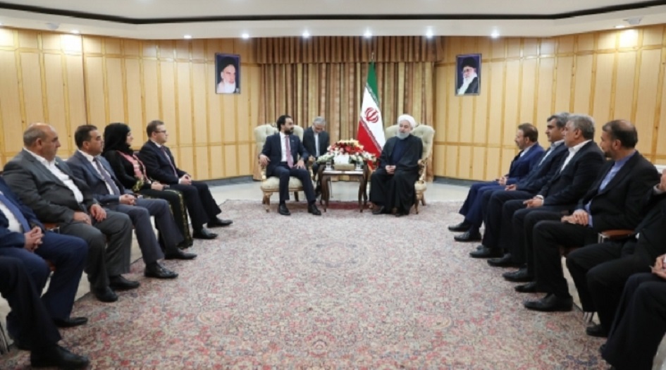 روحاني والحلبوسي يجتمعان بشمال إيران ويشددان على التعاون الثنائي 