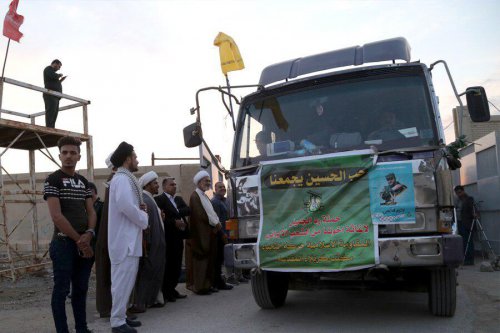ورود کاروان کمکهای جنبش النجباء عراق برای سیل زدگان + عکس