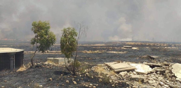 بالصور.. حرائق نينوى تلتهم قرية جنوب الموصل