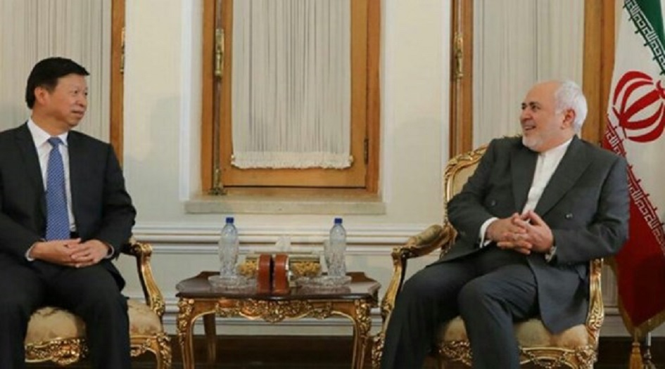 ظريف يبحث مع مسؤول صيني العلاقات الثنائية والقضايا الدولية