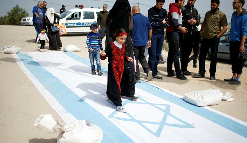شاهد... رسم العلم الإسرائيلي على شوارع بغداد والسبب؟