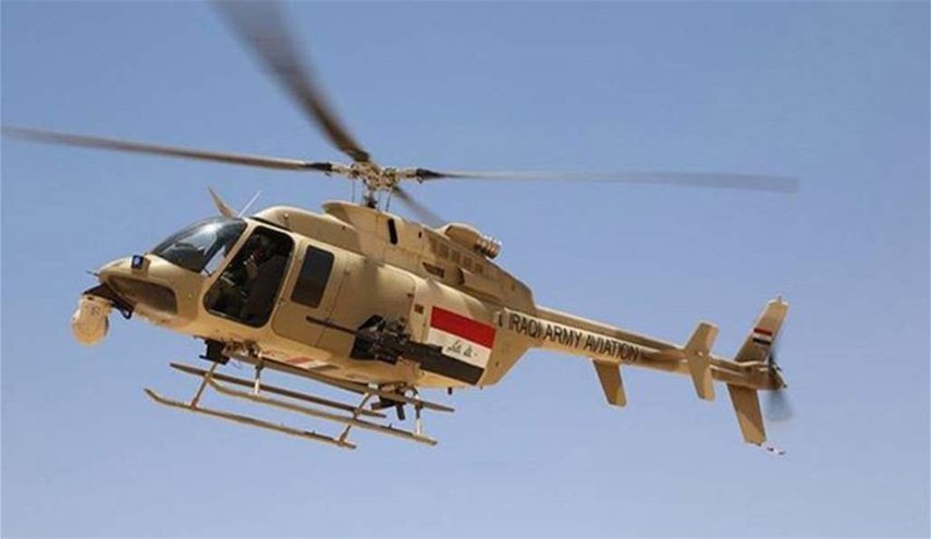 بالصور:  الطيران العراقي يلقي منشورات فوق كربلاء.. ما القصة؟