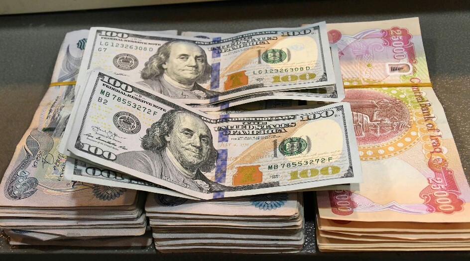 اللجنة المالية العراقية تحسم مسألة سعر صرف الدولار