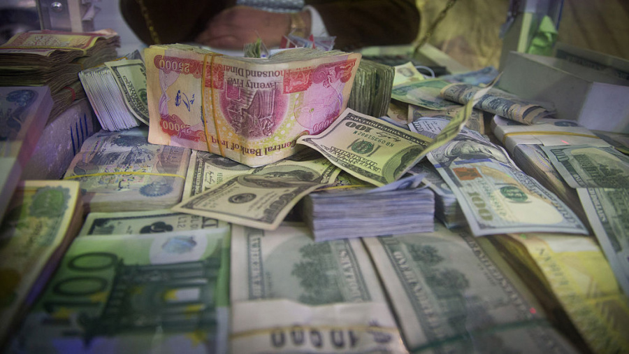 الكشف عن السقف الزمني لخفض سعر الدولار في العراق