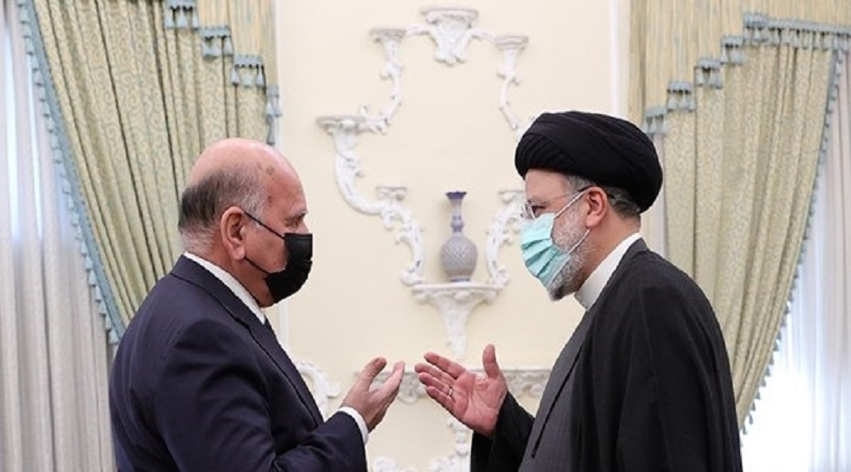 الرئيس الإيراني ووزير الخارجية العراقي يبحثان العلاقات الثنائية بين البلدين