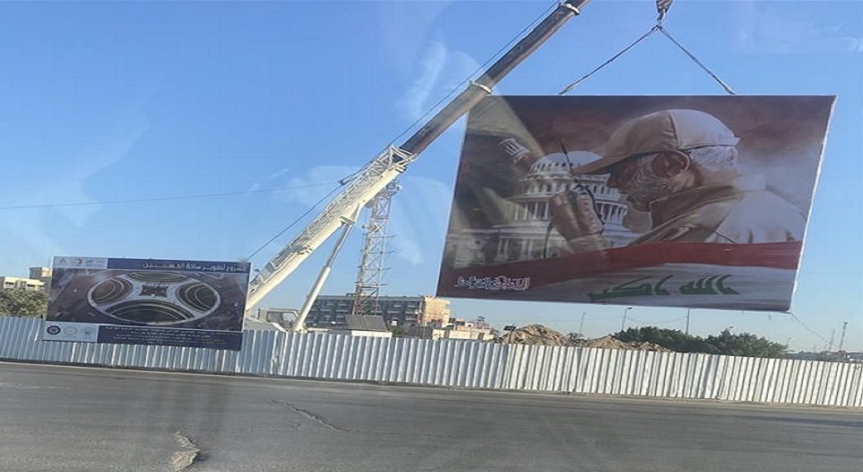 العراق.. نصب جدارية عملاقة  للشهيد ابومهدي المهندس وسط بغداد