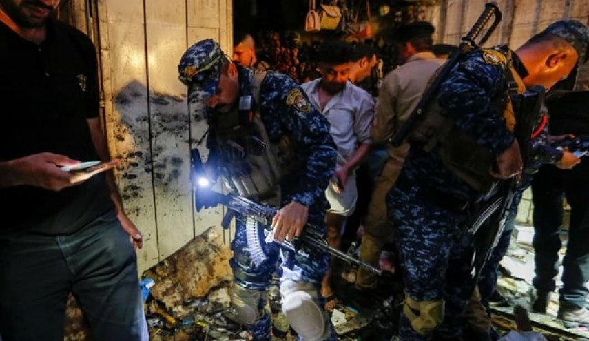 بالصور.. انفجاران يستهدفان مصرفين وسط بغداد 
