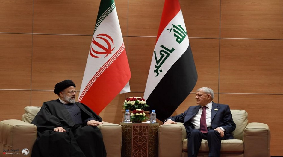 على هامش قمة الجزائر ... الرئيس الايراني يلتقي نظيره العراقي